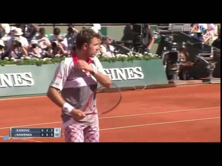 Stan Wawrinka hits around the net in French Open 2015 final